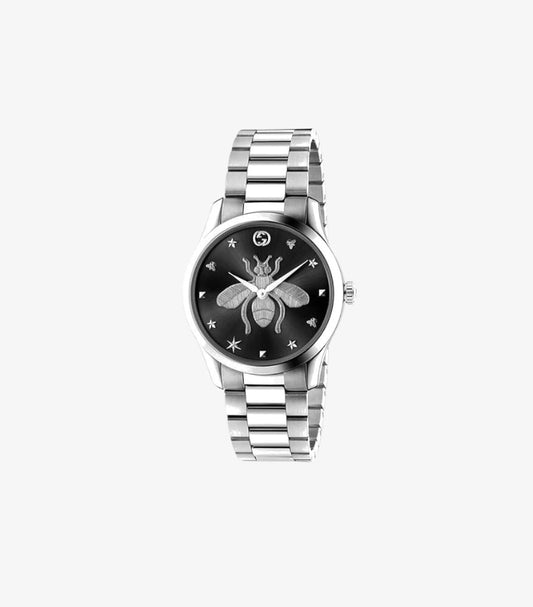 Gucci G-Timeless YA1264136 38mm Women's Watch – Black Matte Dial with Large Embossed Silver Bee Motif, Alternating Bee and Star Hour Markers, Double-G Logo and Three-Row Stainless Steel Bracelet – Front Angled View