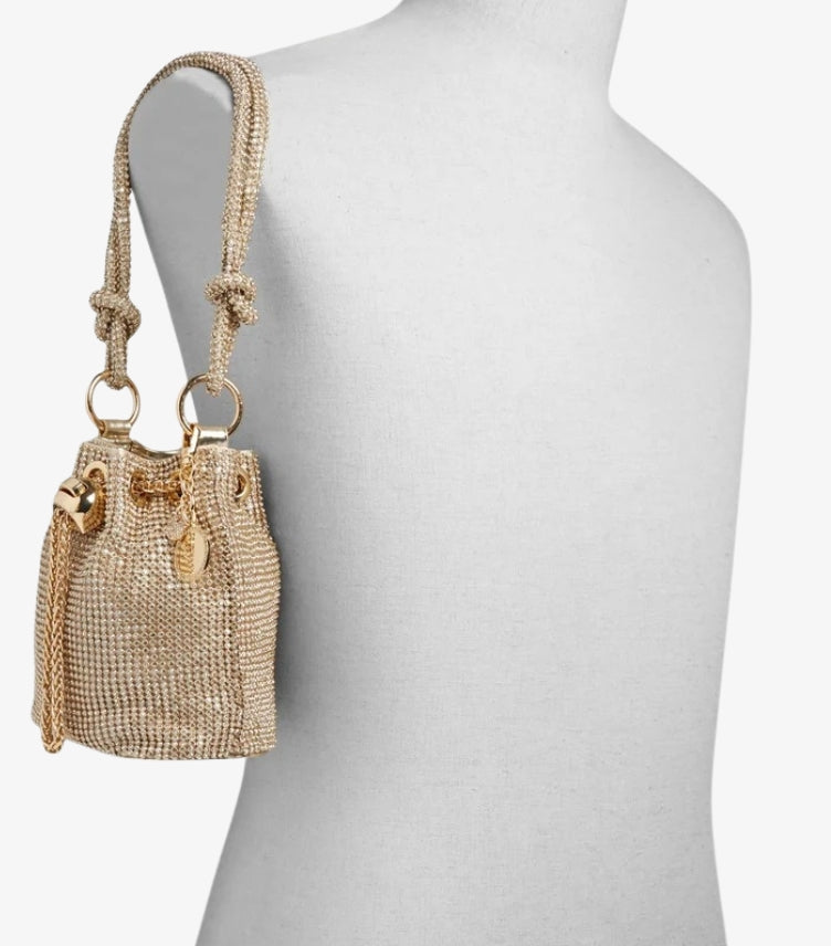ALDO crystal mini bucket bag displayed over the shoulder showing compact cylindrical shape