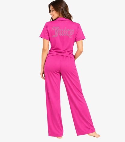 Back view of Juicy Couture women’s pink ribbed pyjama set with wide-leg trousers and large embellished Juicy logo