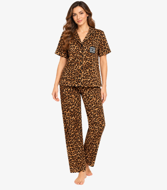 Juicy Couture Women's Brown Leopard Print Pajama Set featuring a button-down short-sleeve shirt with signature logo patch and matching relaxed-fit trousers.