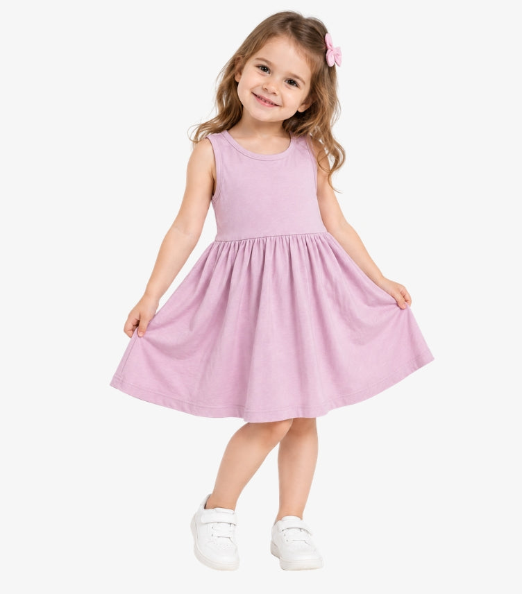 Girl wearing an F&F pink sleeveless jersey skater dress with a round neckline and gathered flared skirt