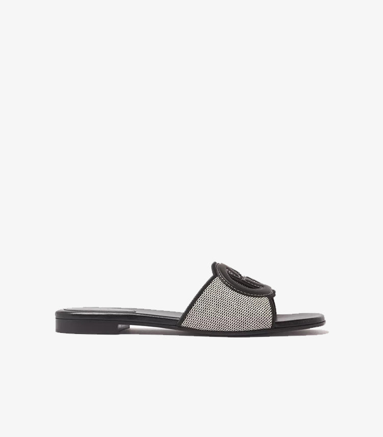 Gucci Interlocking G flat slide sandals black canvas side profile view