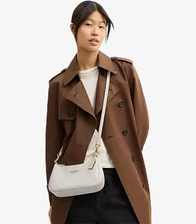 Female Model Carrying Coach Teri Signature Canvas Shoulder Bag