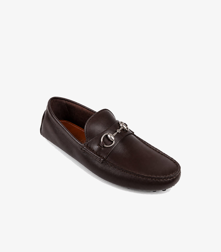 Gucci men's dark brown leather Horsebit driving loafer angled view showing silver hardware and pebble sole