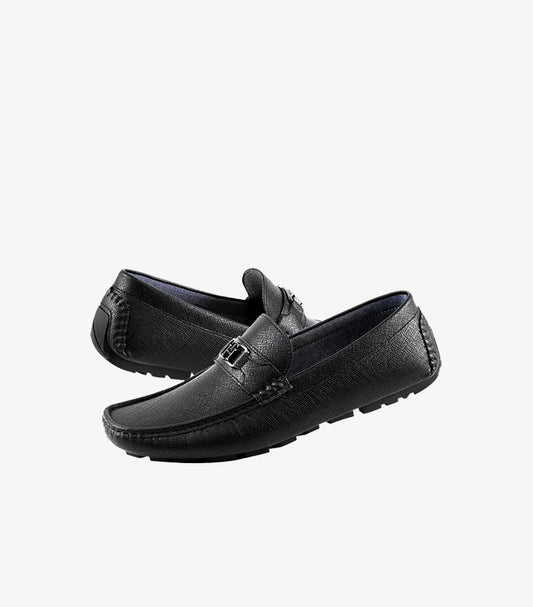 Tommy Hilfiger men's black leather driver loafers with textured finish, metal logo detail, and flexible driving sole, pair view.