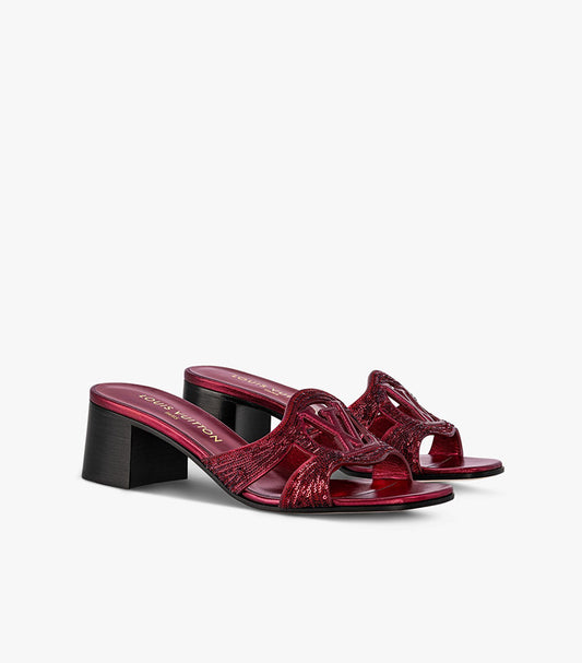 LOUIS VUITTON EMBELLISHED LOGO SLIDE HEELS