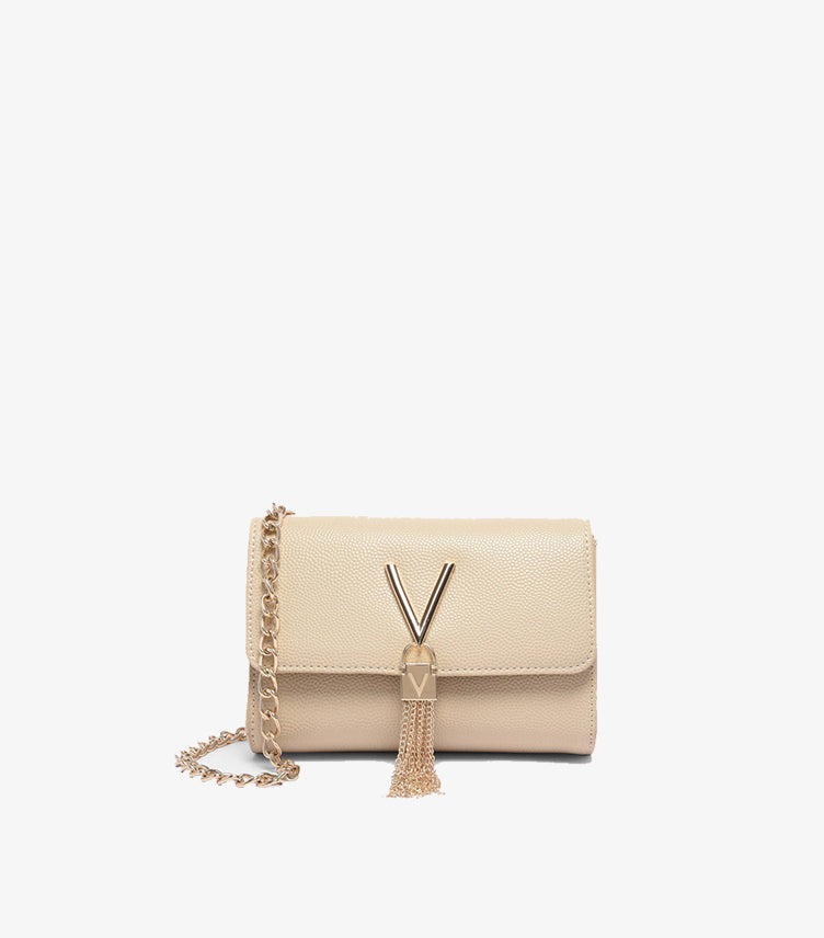 Front view of Valentino by Mario Valentino ivory crossbody bag with V-logo clasp, chain tassel and gold strap