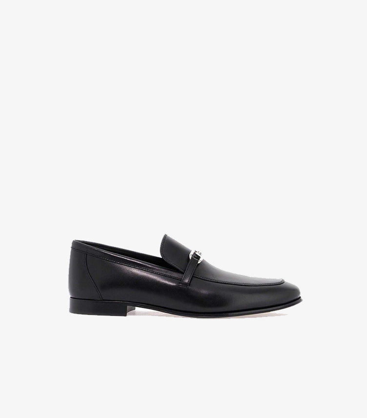 Side view of Fendi men’s smooth leather loafer with signature FF hardware and slim formal sole