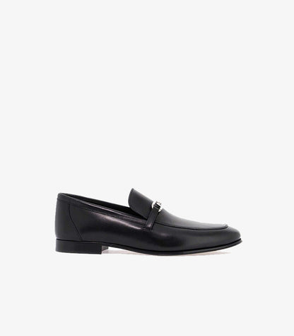 Side view of Fendi men’s smooth leather loafer with signature FF hardware and slim formal sole