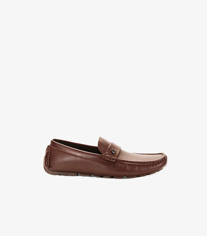 GUESS men's driving loafers featuring textured upper, moc-toe stitching, signature G logo and slip-on design