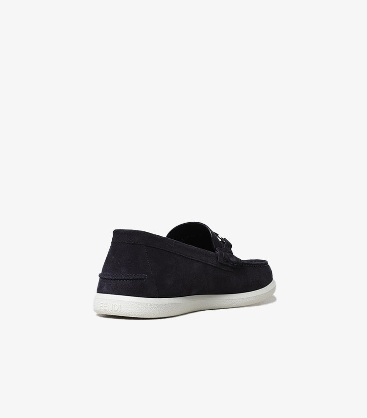 Rear angle of Fendi men's luxury suede loafers with durable rubber outsole and elegant slip-on design.