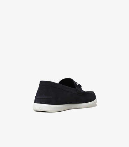 Rear angle of Fendi men's luxury suede loafers with durable rubber outsole and elegant slip-on design.