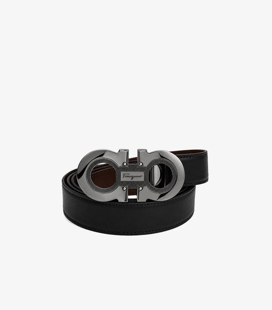 Salvatore Ferragamo Gancini reversible black brown leather belt coiled view