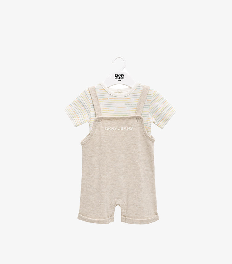 Front view of DKNY Jeans baby boys’ beige short dungarees with striped T-shirt, embroidered logo and button straps
