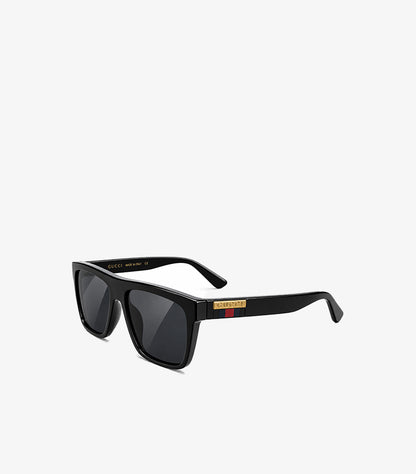 Angled view of Gucci rectangular sunglasses showing wide temples, gold-tone logo plaques and Web stripe details