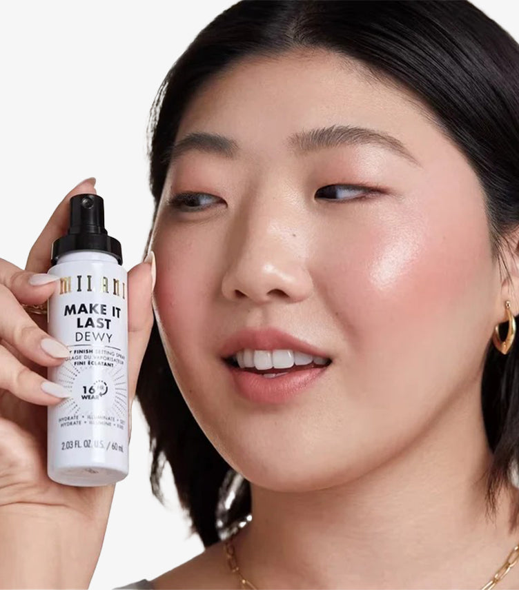 Model using Milani Make It Last Dewy Setting Spray