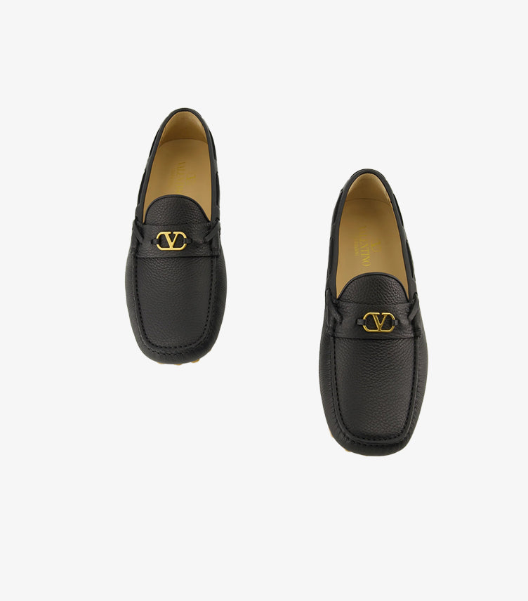 Valentino Garavani men's black pebbled leather driving loafers with gold VLogo hardware top view