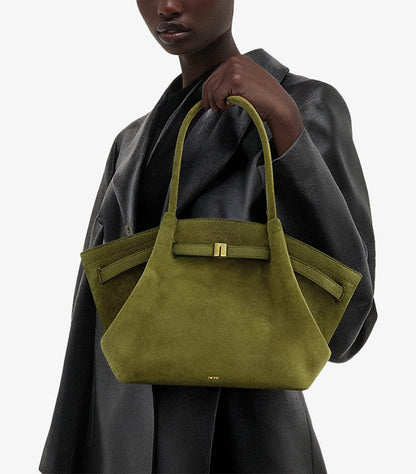 Woman carrying the JW PEI Hana medium faux-suede tote bag over her shoulder