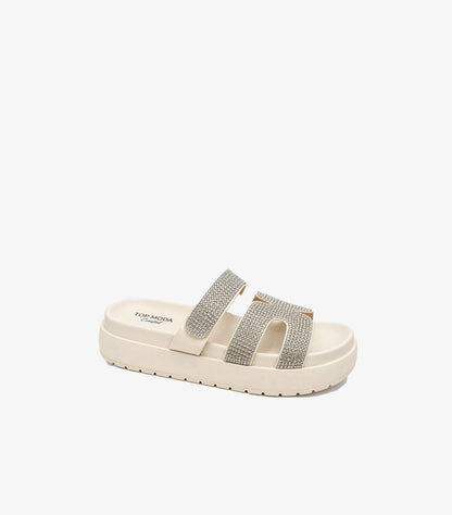 Side view of Top Moda rhinestone slide sandals showing the chunky platform sole and open-toe silhouette
