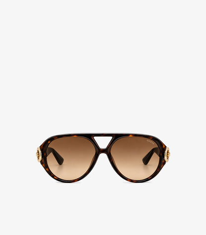 Front view of Guess women’s oversized tortoiseshell aviator sunglasses with brown gradient lenses and gold-tone G logo accents