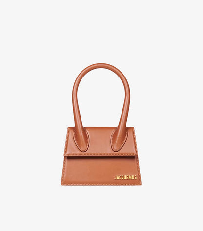 Jacquemus structured leather mini handbag front view with top handles and gold logo.