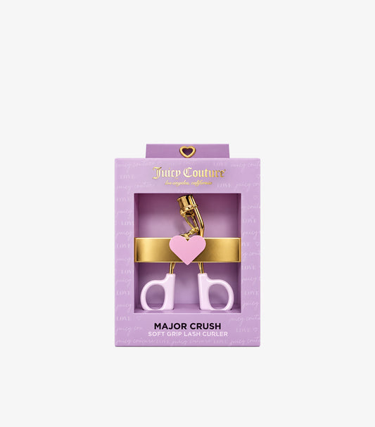 Juicy Couture Major Crush Soft Grip Lash Curler in pastel purple and gold with lavender gift packaging.