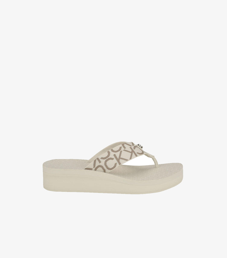 Calvin Klein women’s platform thong sandal shown from the side