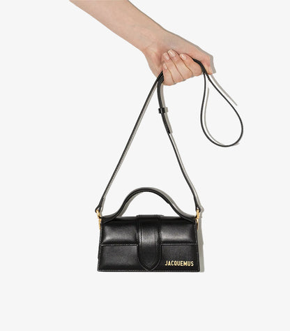 Jacquemus Le Bambino Long black crossbody bag with top handle and extended strap