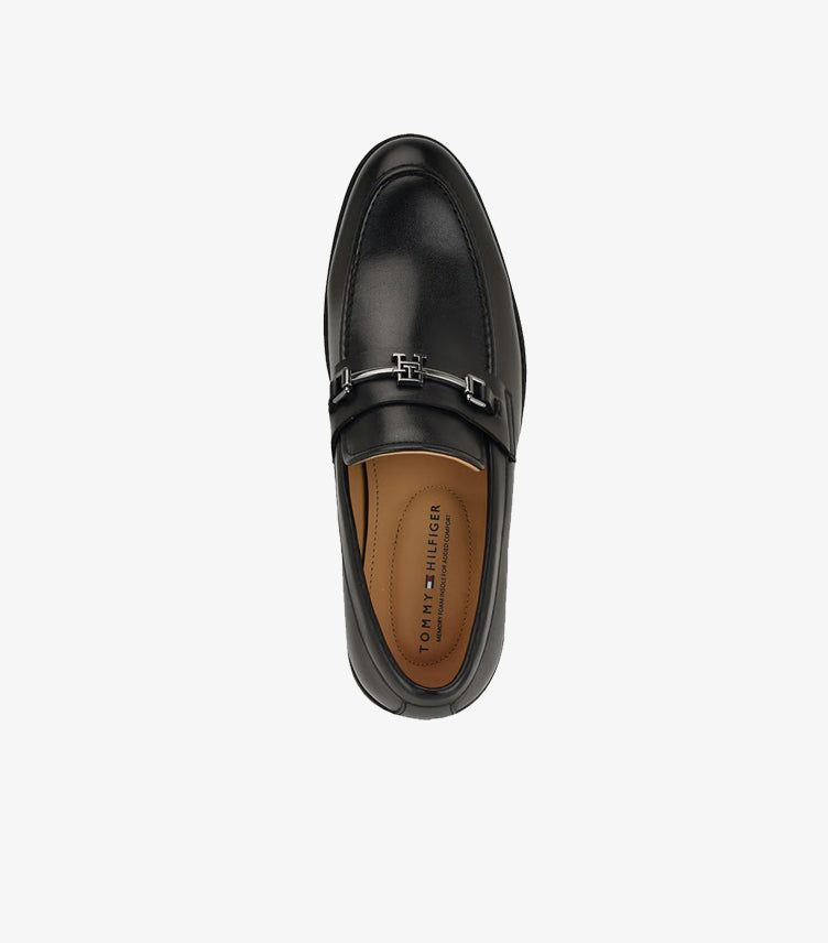 Top view of Tommy Hilfiger men's premium black leather loafers with cushioned footbed and signature horsebit detail.