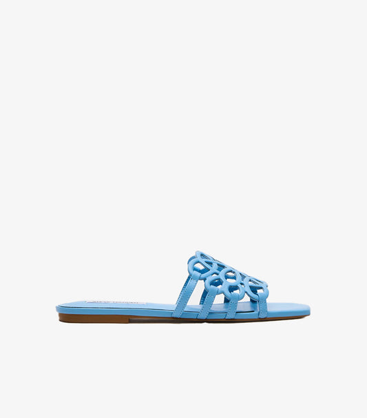 Angled view of Steve Madden blue open-toe slide sandals with square toes and cutout uppers