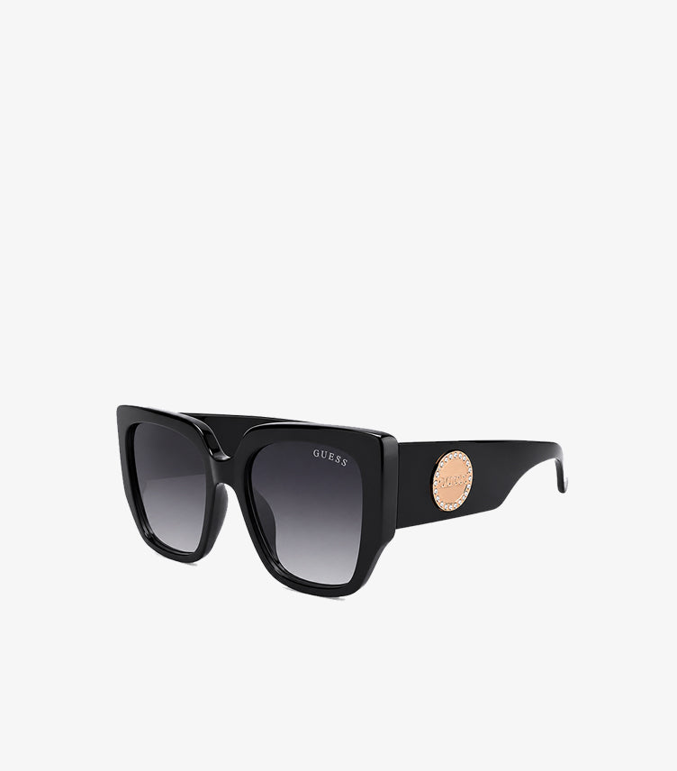 GUESS black oversized square sunglasses side view with crystal logo medallion
