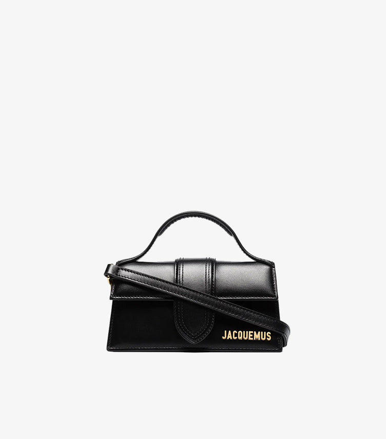 Front view of Jacquemus Le Bambino Long black leather mini bag with gold logo