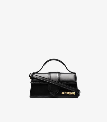 Front view of Jacquemus Le Bambino Long black leather mini bag with gold logo