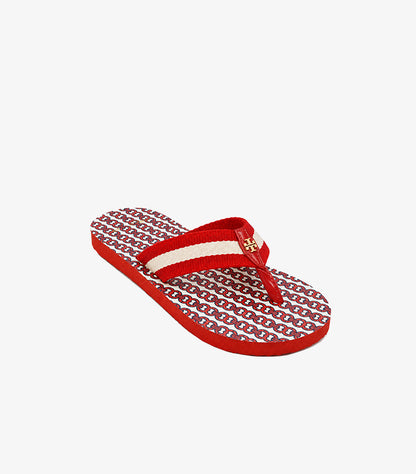 Angled view of Tory Burch women’s red printed flip-flop with striped strap and gold Double T logo