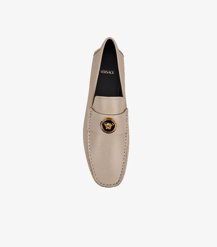 Top view of Versace beige Medusa leather loafers