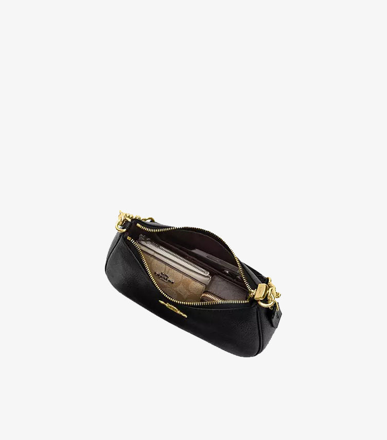 Coach Teri bag interior showing multifunction pocket two card slots and fabric lining