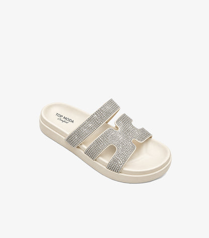 Angled view of Top Moda women’s platform slide sandals with rhinestone straps and a cut-out front design