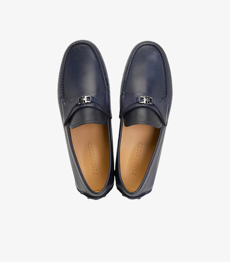 Top view of Ferragamo men’s navy blue leather Gancini driving loafers
