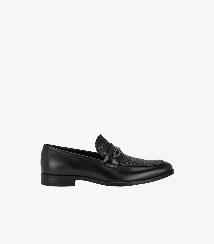 Side view of Guess men’s mixed-texture dress loafer with horsebit detail and slim formal sole