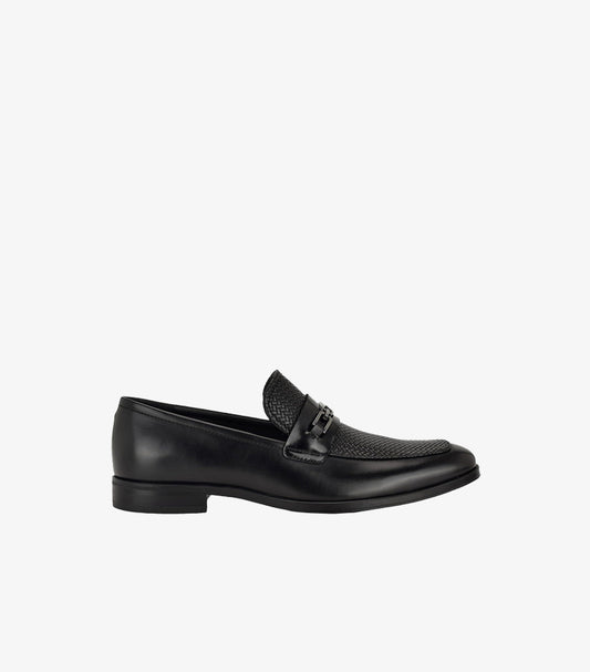 Side view of Guess men’s mixed-texture dress loafer with horsebit detail and slim formal sole