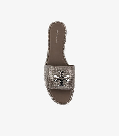 Tory Burch Eleanor crystal flat slide sandal top-down view showing allover rhinestone strap silver double-T logo and TORY BURCH branded insole