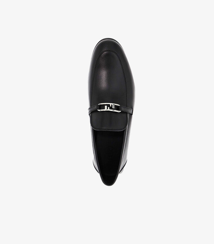 Top view of Fendi men’s leather loafer with apron-toe stitching and signature FF logo hardware