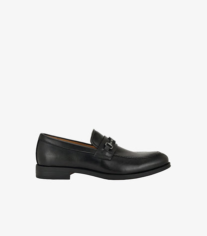 Side view of Tommy Hilfiger men's black leather loafers featuring horsebit hardware and durable rubber outsole.