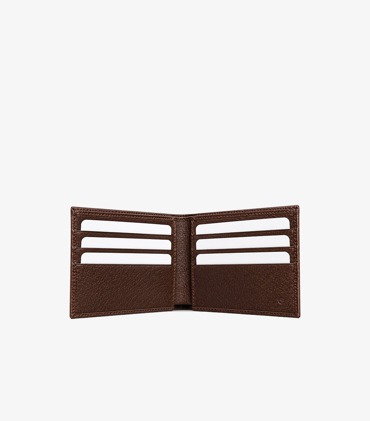 Gucci GG Supreme bifold wallet open interior showing six card slots and leather-lined compartments
