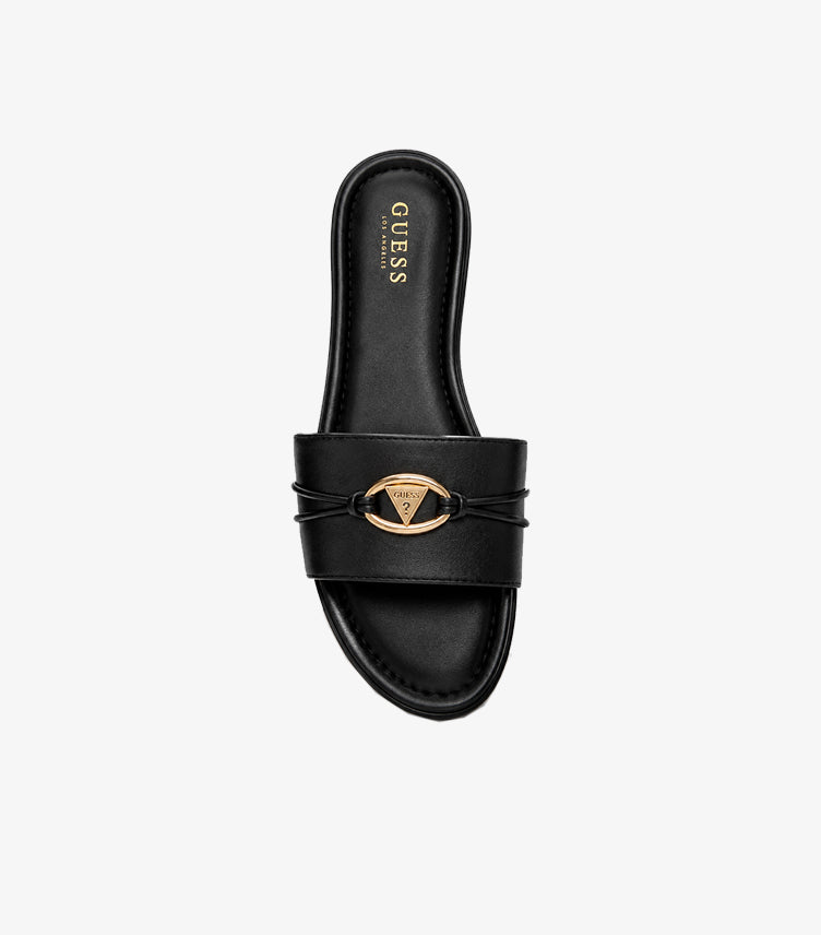 Top view of Guess women’s black flat slide sandal with gold-tone triangle logo emblem