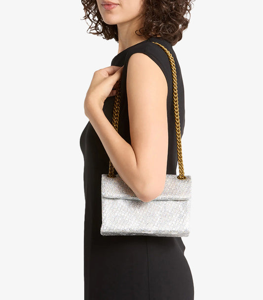Kurt Geiger London Kensington Mini Silver Iridescent Crystal Sequin Bag with Antique Gold Eagle Clasp and Chunky Chain Strap – Worn on Shoulder by Female Model in Black Dress