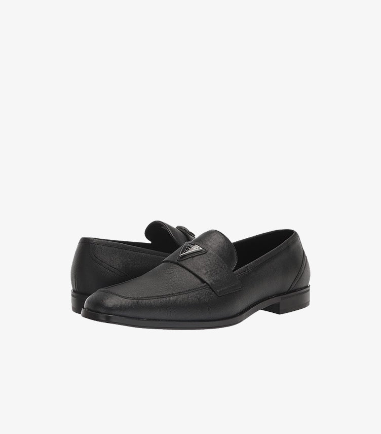 Pair of GUESS men's black leather penny loafers