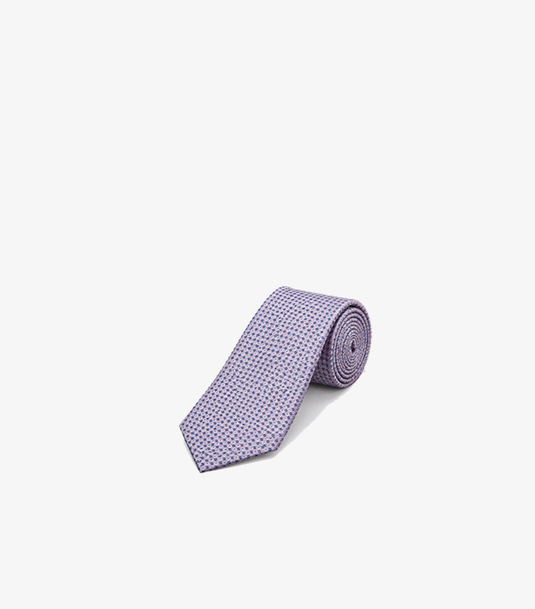 Rolled Tommy Hilfiger men’s formal necktie featuring a finely woven micro-geometric pattern and classic pointed blade