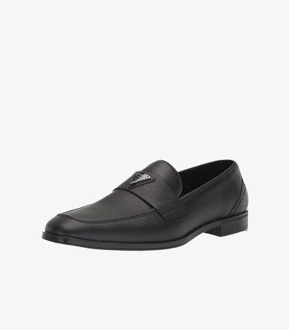 GUESS men's black textured leather penny loafers - angled product shot