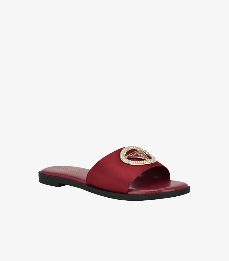 Angled view of Guess women’s burgundy logo slide sandal with sparkling crystal embellishments